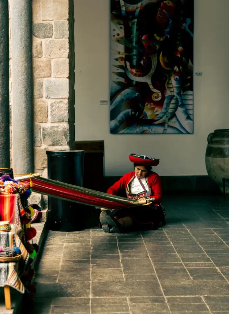 A woman from the Andes is making bright alpaca wool textiles with old ways in the highlands of Peru.