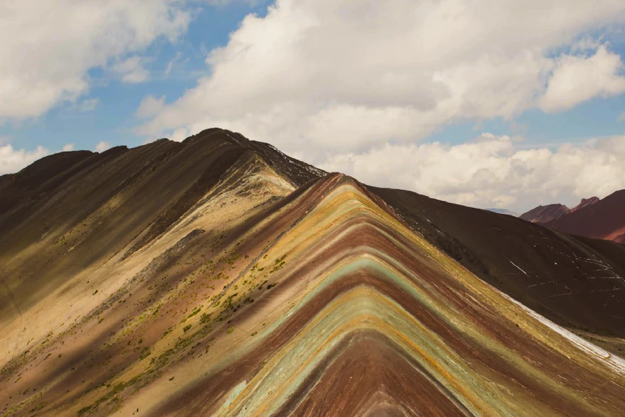 Colorful mineral ridges of Palcoyo Rainbow Mountain in the Peruvian Andes
