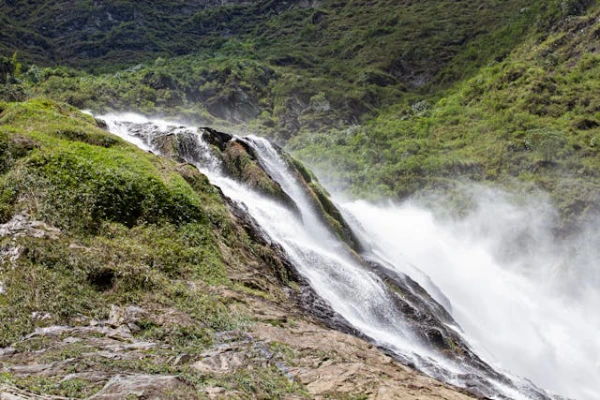La Miel waterfall in Abejorral Antioquia surrounded by Andean mountain landscapes during a Colombia hiking experience